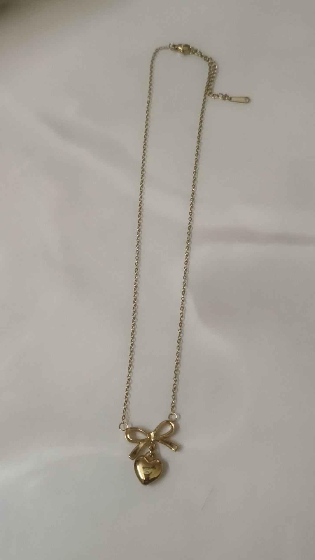 Gold Bow Heart Pendant Necklace